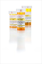 Three non-proprietary medicine prescription bottle isolated on a white background