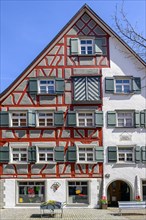 Half-timbered house with divided facade