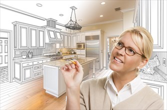 Creative woman with pencil over custom kitchen design drawing and photo combination