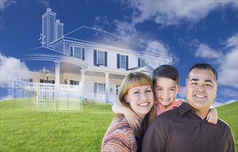 Young happy mixed-race family and ghosted house drawing on grass