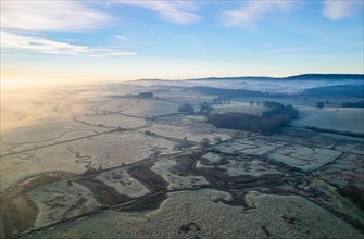 RSPB Exminster and Powderham Marshes and River Exe from a drone at sunrise