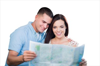 Young military couple looking at map isolated on white