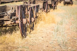 Abstract of vintage antique wood wagons and wheels