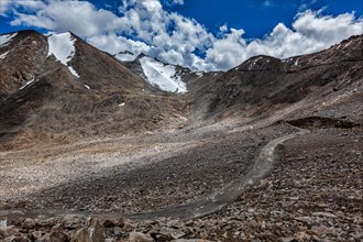 High altitude mountain road in Himalayas near Kardung La pass in Ladakh