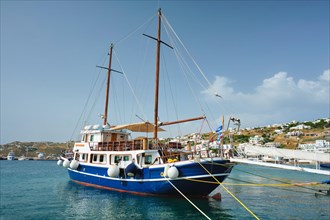Vessel schooner moored in port harbor of Chora town