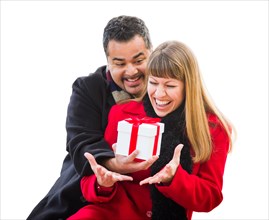 mixed-race couple exchanging christmas gift isolated on white