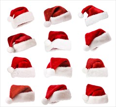 Set of Santa's red hats isolated on white