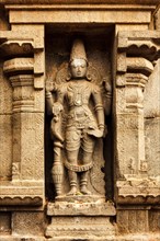 Hindu god Vishnu stone bas relief in Hindu temple