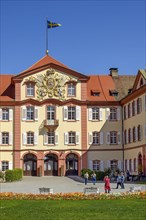 Palace facade with coat of arms