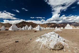 Whitewashed Buddhist chortens Tibetan Buddhist stupas
