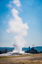 Old faithful geyser erupting at yellowstone national park