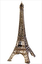 Small bronze copy of Eiffel tower figurine isolated on white background
