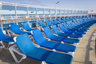 Abstract of luxury passenger cruise ship deck and chairs