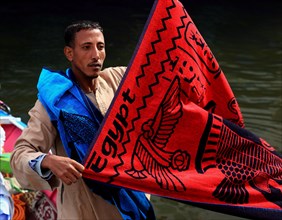 Souvenir seller with a rowing boat on the Nile