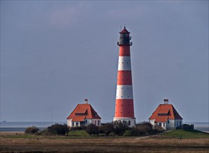 Westerheversand Lighthouse on the North Sea coast in the Schleswig-Holstein Wadden Sea National Park