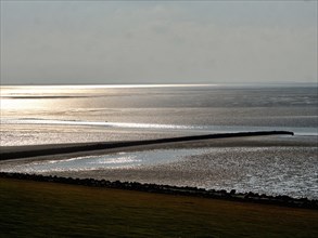Light reflections on the North Sea in the Schleswig-Holstein Wadden Sea National Park off Nordstrand