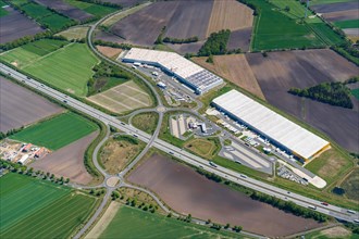 Aerial view of logistics halls on the A1 motorway