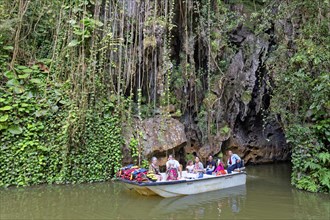 Tourists ride on stream