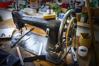Old sewing machine in a saddlery in Allgaeu