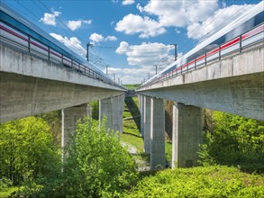 ICE trains pass the Saubachtal bridge