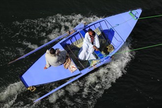 Souvenir seller with a rowing boat on the Nile