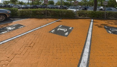 Specially marked family parking spaces at the railway station