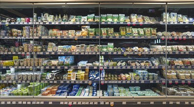 Shelves with dairy products in an organic supermarket