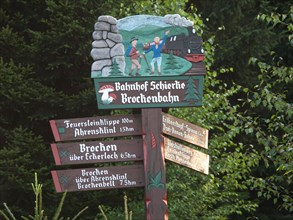 Signpost at Schierk railway station in the Harz National Park