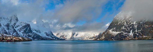 Panorama of Norwegian fjord and mountains with snow in winter. Lofoten islands