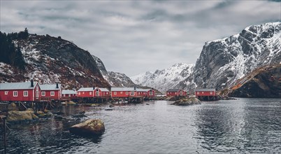 Nusfjord authentic fishing village with traditional red rorbu houses in winter. Lofoten islands