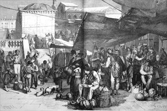 Vegetable market at the Rialta Bridge in Venice with vendors and customers in 1880