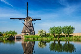 Netherlands rural landscape with windmills at famous tourist site Kinderdijk in Holland