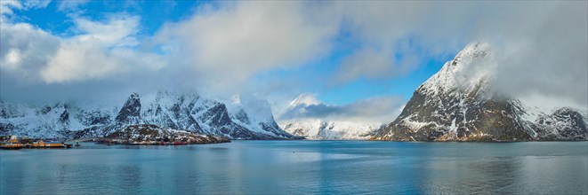 Panorama of Norwegian fjord and mountains with snow in winter. Lofoten islands