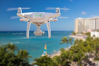Drone flying above waikiki beach in hawaii