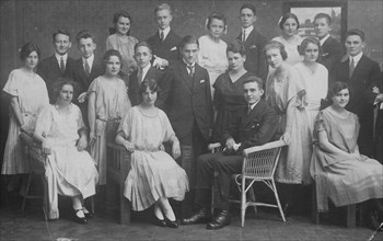 Group photo of an extended family in elegant clothing