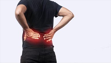 A sore man with back pain