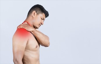 Shirtless person with neck muscle pain