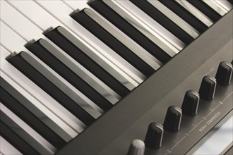 Abstract digital piano keyboard & controls