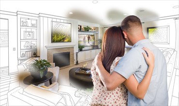 Curious young military couple looking over custom living room design drawing photo combination