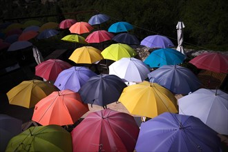 Colourful umbrellas providing shade in a restaurant