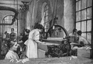Arbeiter in einer Weberei