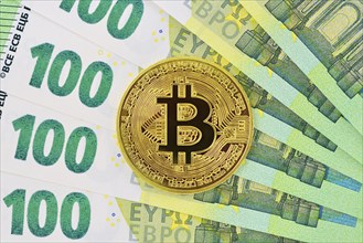 Bitcoin and 100 Euro Notes