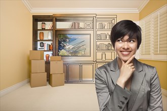 Young mixed-race female looking to the side in room with drawing of entertainment unit on wall