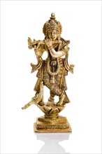 Krishna god Vishnu avatar brass statue isolated on white with reflection