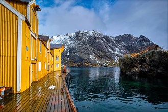 Nusfjord authentic fishing village in winter with red rorbu houses. Lofoten islands