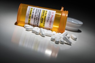 Hydrocodone pills and prescription bottle with non proprietary label. no model release required