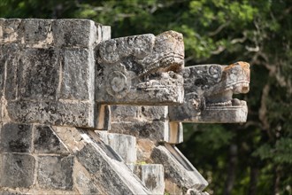 Mayan jaguar figurehead sculptures at the archaeological site in chichen itza