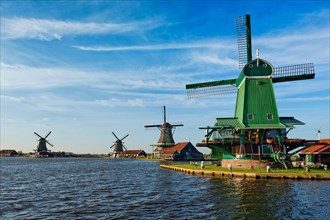 Netherlands rural landscape Windmills at famous tourist site Zaanse Schans in Holland. Zaandam