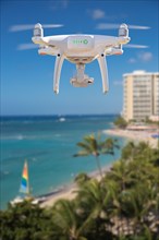 Drone flying above waikiki beach in hawaii