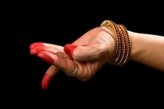 Woman hand showing Chatura hasta